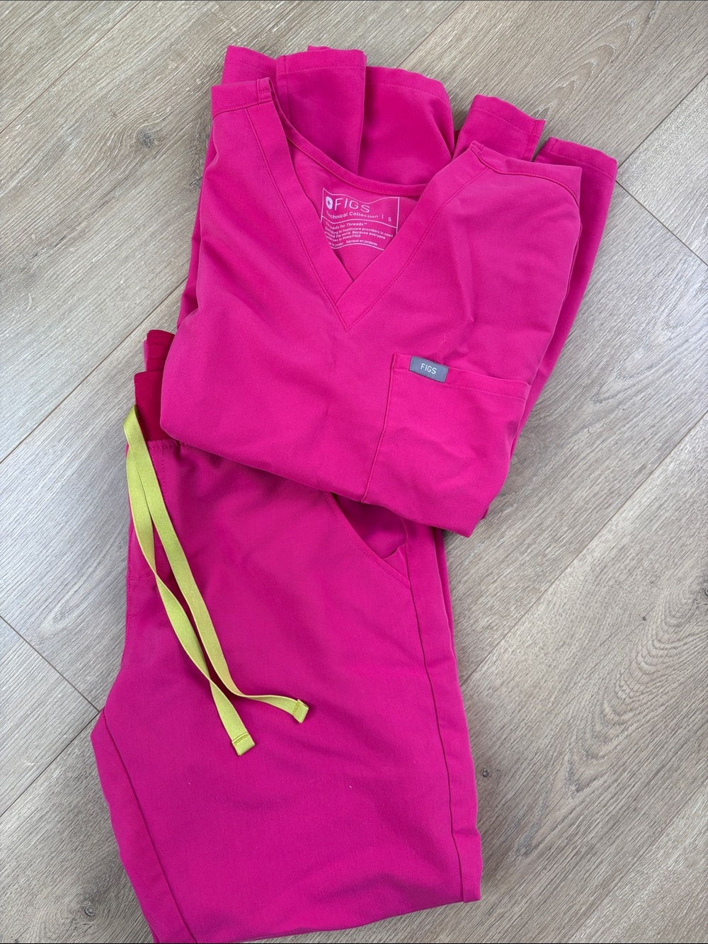 Figs Women's Scrub Set in Bright Fuchsia with green Drawstrings